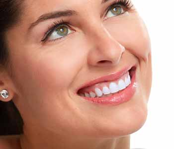 At Holistic Dental Centers , Dr. Carl McMillan provides solution for teeth whitening